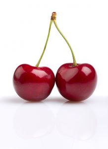 Cherries on white background