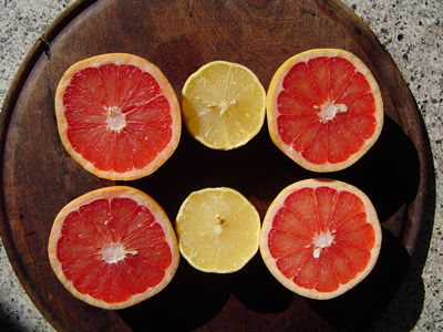 Grapefruit on wood plate